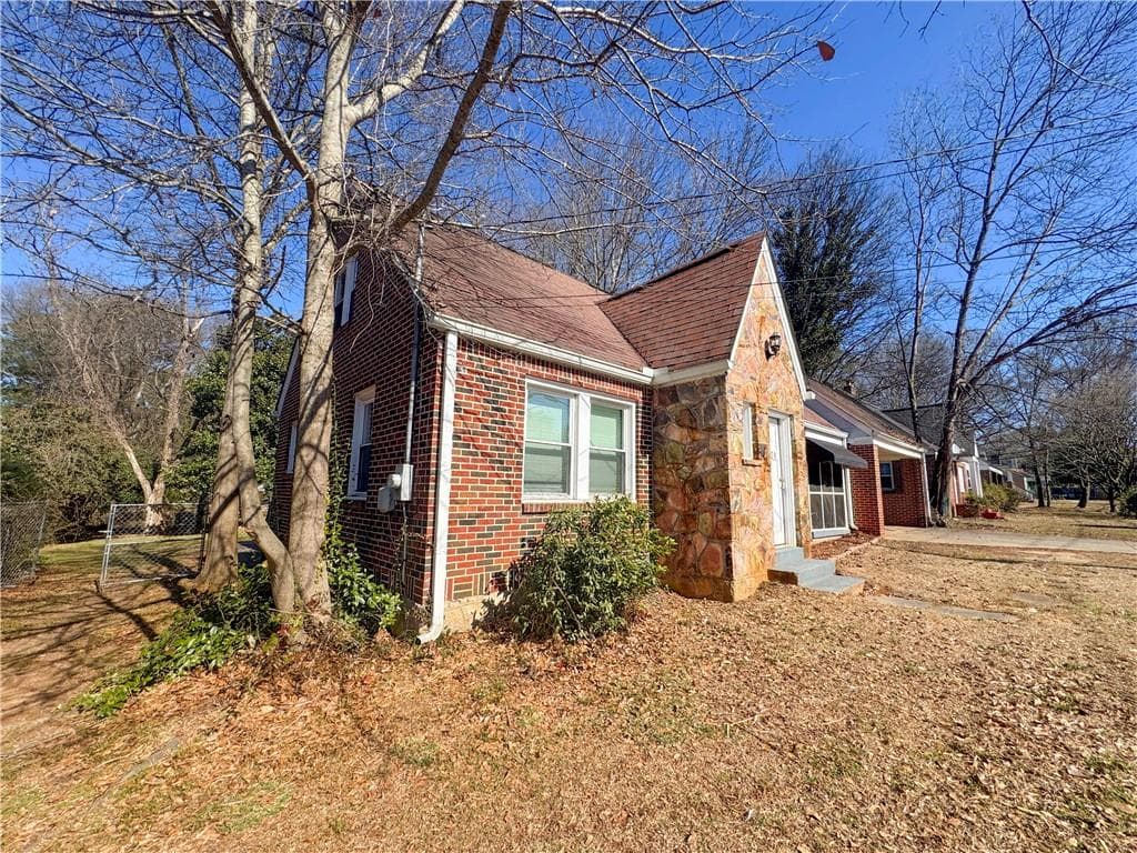 5 bedroom, 3 bathroom, 1,963 sq ft single family residence for sale at 2079 Ben Hill Road, Atlanta, GA 30344 — photo 2