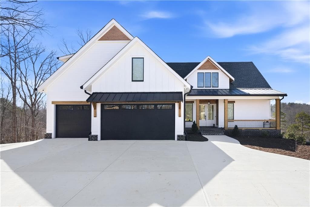 3 bedroom, 5 bathroom, 5,562 sq ft single family residence sold at 5805 Archer Avenue, Cumming, GA 30041