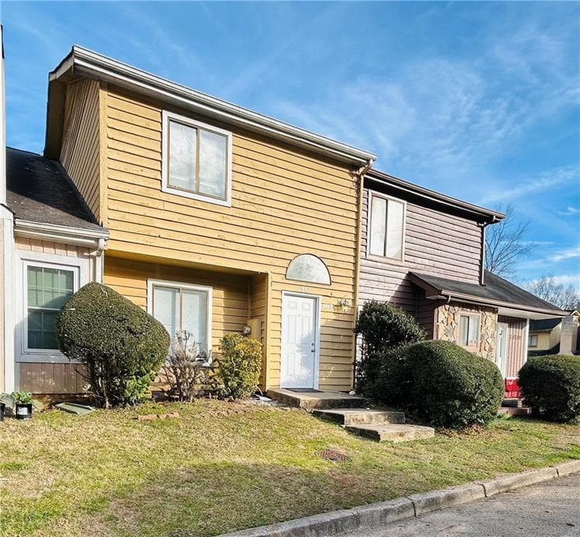 2 bedroom, 3 bathroom, 1,240 sq ft townhouse for sale at 5841 Trent Walk Drive, Lithonia, GA 30038