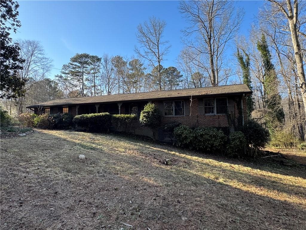 3 bedroom, 3 bathroom, 1,296 sq ft single family residence for sale at 3955 Demooney Road, Atlanta, GA 30349