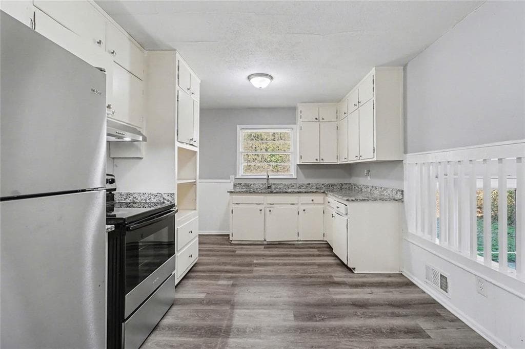 4 bedroom, 2 bathroom, 2,060 sq ft single family residence for sale at 1489 Pine Drive, Atlanta, GA 30349 — photo 7