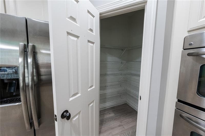 7 bedroom, 4 bathroom, 4,113 sq ft single family residence for sale at 3245 Sparling Street, Cumming, GA 30041 — photo 3