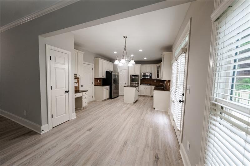 7 bedroom, 4 bathroom, 4,113 sq ft single family residence for sale at 3245 Sparling Street, Cumming, GA 30041 — photo 4