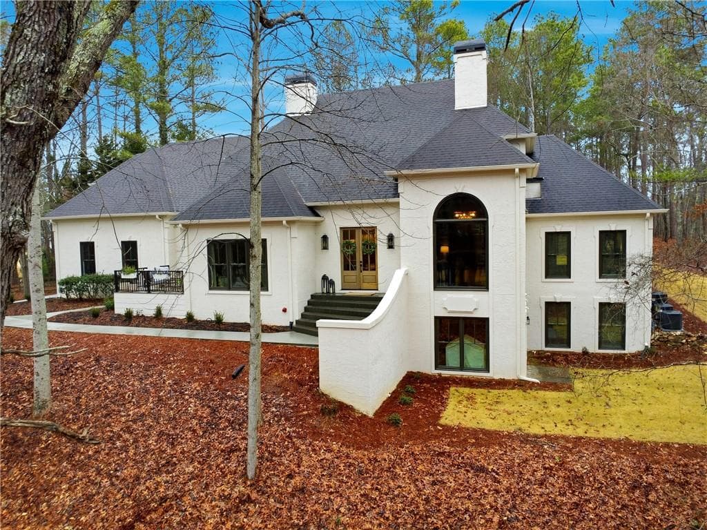 6 bedroom, 5 bathroom, 5,873 sq ft single family residence sold at 12995 Bucksport Drive, Roswell, GA 30075