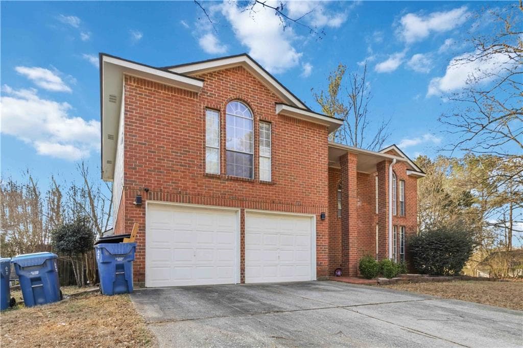 4 bedroom, 3 bathroom, 2,430 sq ft single family residence for sale at 2170 Hunters Ridge Drive, Lawrenceville, GA 30044 — photo 2