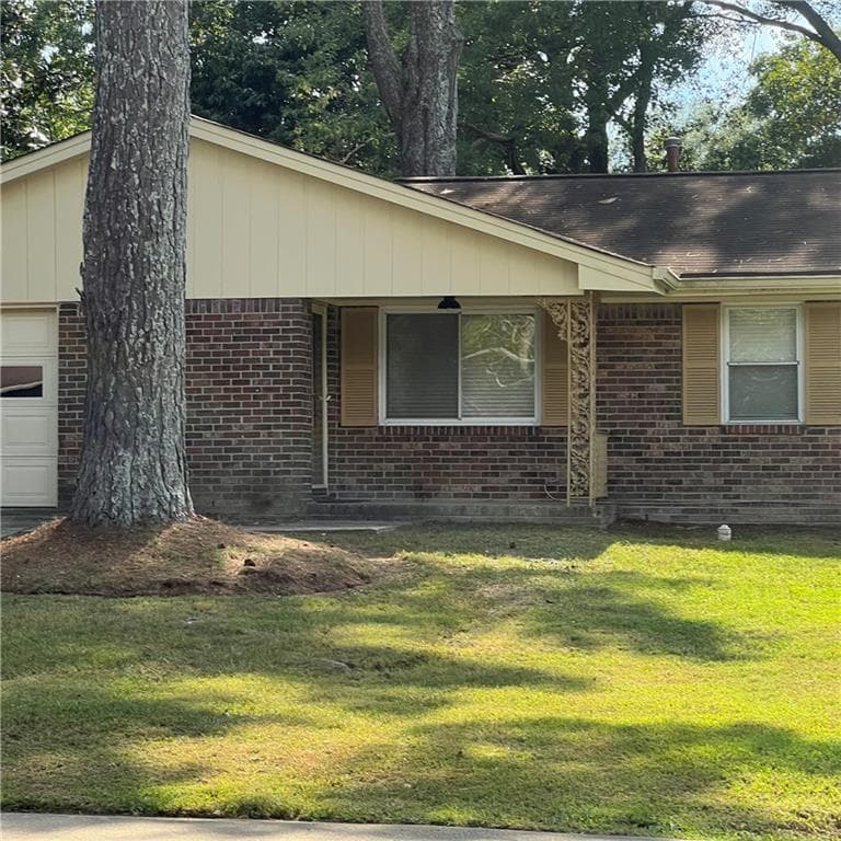 3 bedroom, 2 bathroom, 1,337 sq ft single family residence for sale at 6435 Connell Road, Atlanta, GA 30349 — photo 2