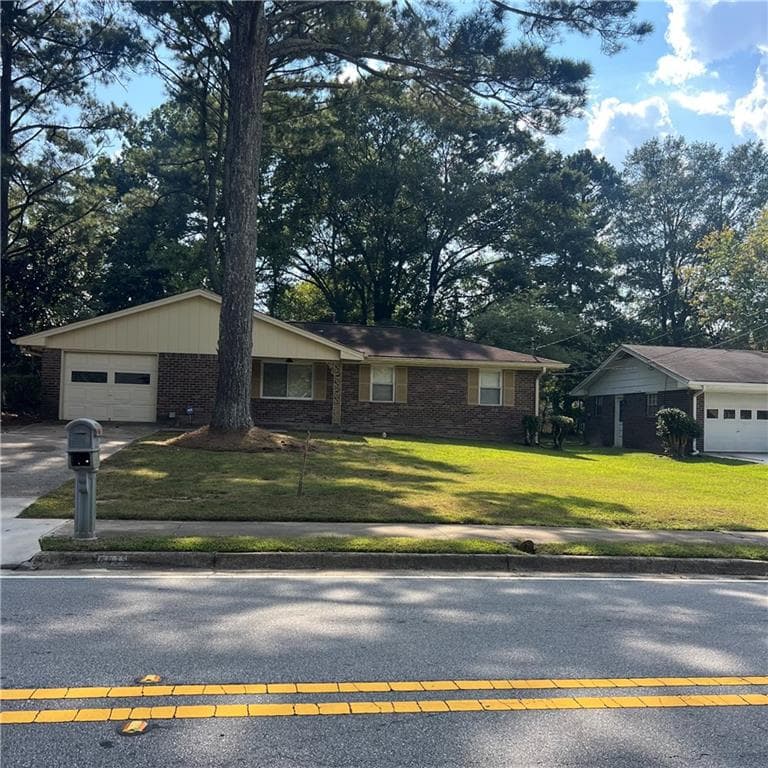 3 bedroom, 2 bathroom, 1,337 sq ft single family residence for sale at 6435 Connell Road, Atlanta, GA 30349 — photo 3