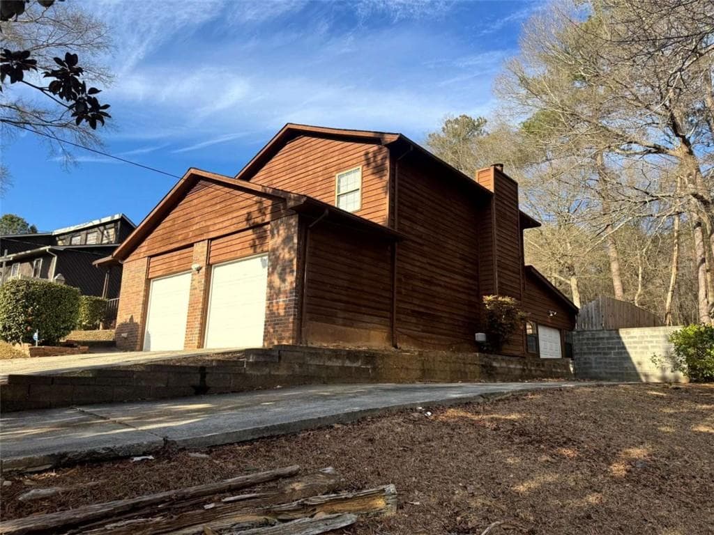3 bedroom, 2 bathroom, 1,638 sq ft single family residence under contract at 8678 Glenwoods Drive, Riverdale, GA 30274 — photo 2