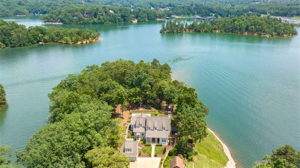 4 bedroom, 5 bathroom, 3,150 sq ft single family residence sold at 218 Lake Pointe Drive, Gainesville, GA 30506