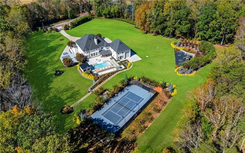 8 bedroom, 10 bathroom, 14,278 sq ft single family residence sold at 7160 Bennett Road, Cumming, GA 30041