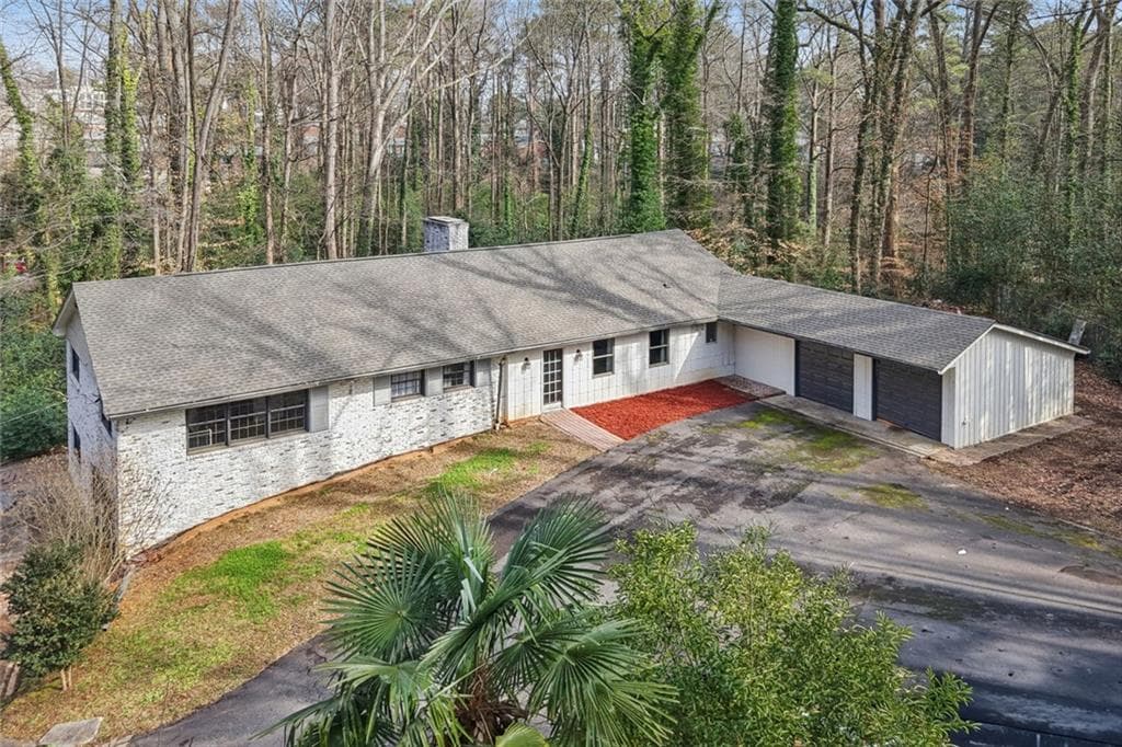 6 bedroom, 3 bathroom, 3,126 sq ft single family residence sold at 5655 Lake Forrest Drive, Atlanta, GA 30342