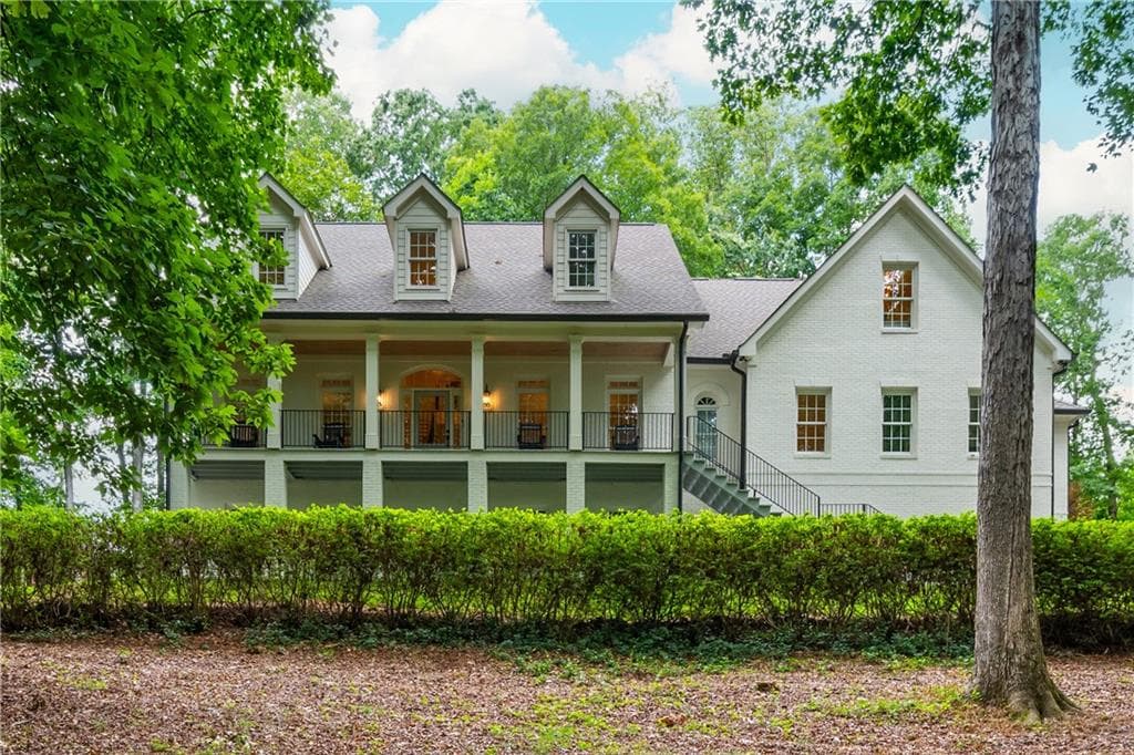 5 bedroom, 6 bathroom, 7,497 sq ft single family residence for sale at 910 Pleasant Hollow Trail, Milton, GA 30004 — photo 2