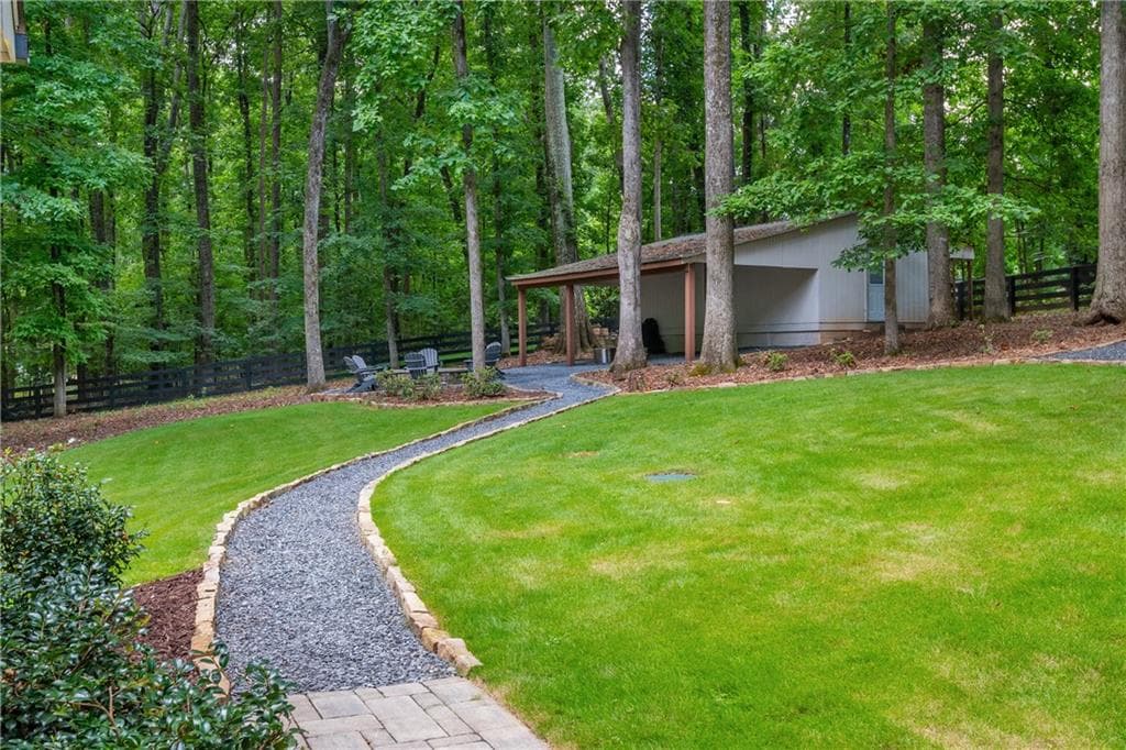 5 bedroom, 6 bathroom, 7,497 sq ft single family residence for sale at 910 Pleasant Hollow Trail, Milton, GA 30004 — photo 6