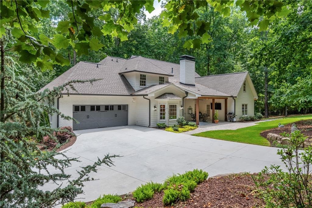 5 bedroom, 6 bathroom, 7,497 sq ft single family residence for sale at 910 Pleasant Hollow Trail, Milton, GA 30004 — photo 1 of 61