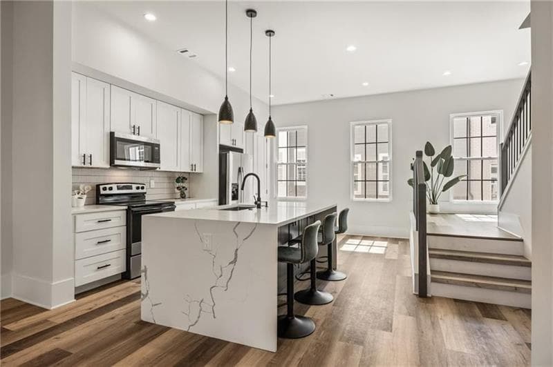 4 bedroom, 4 bathroom, 2,200 sq ft townhouse for sale at 3165 Dogwood Drive 104, Hapeville, GA 30354