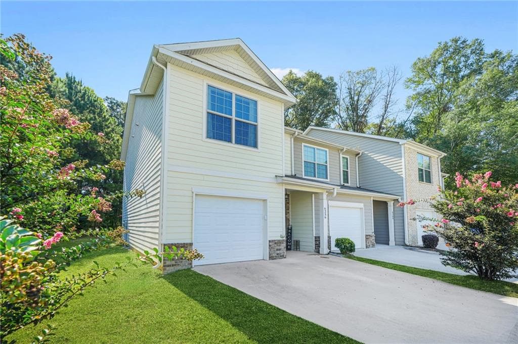 2 bedroom, 3 bathroom, 1,404 sq ft townhouse for sale at 6256 TRICKLE Bend, Atlanta, GA 30349 — photo 2