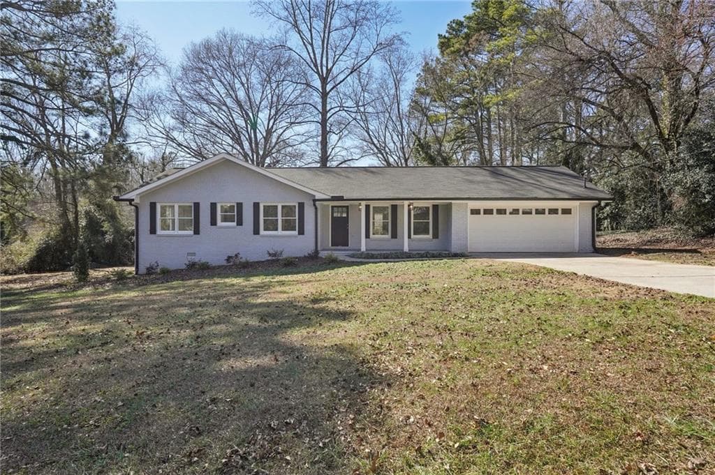 3 bedroom, 2 bathroom, 1,695 sq ft single family residence for sale at 507 Castleaire Drive, Stone Mountain, GA 30087 — photo 5