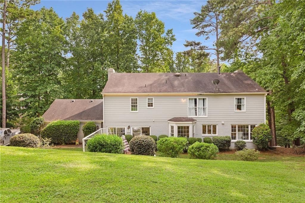 4 bedroom, 4 bathroom, 4,400 sq ft single family residence for sale at 2660 Spalding Drive, Atlanta, GA 30350 — photo 2