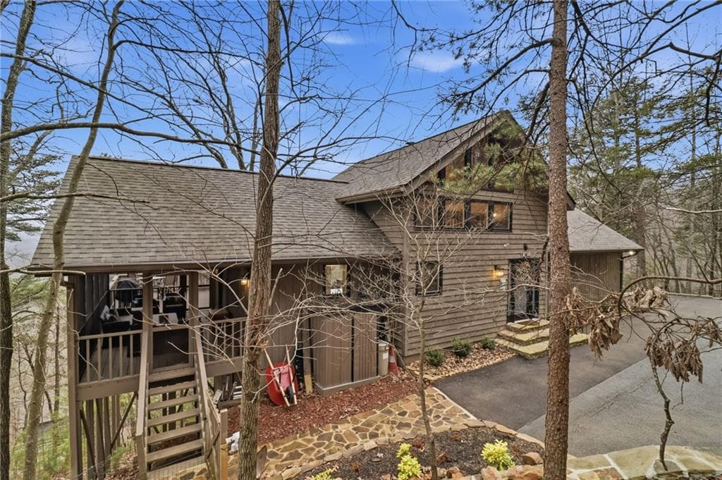 3 bedroom, 4 bathroom, 2,592 sq ft single family residence sold at 674 Grouse Gap Drive, Big Canoe, GA 30143