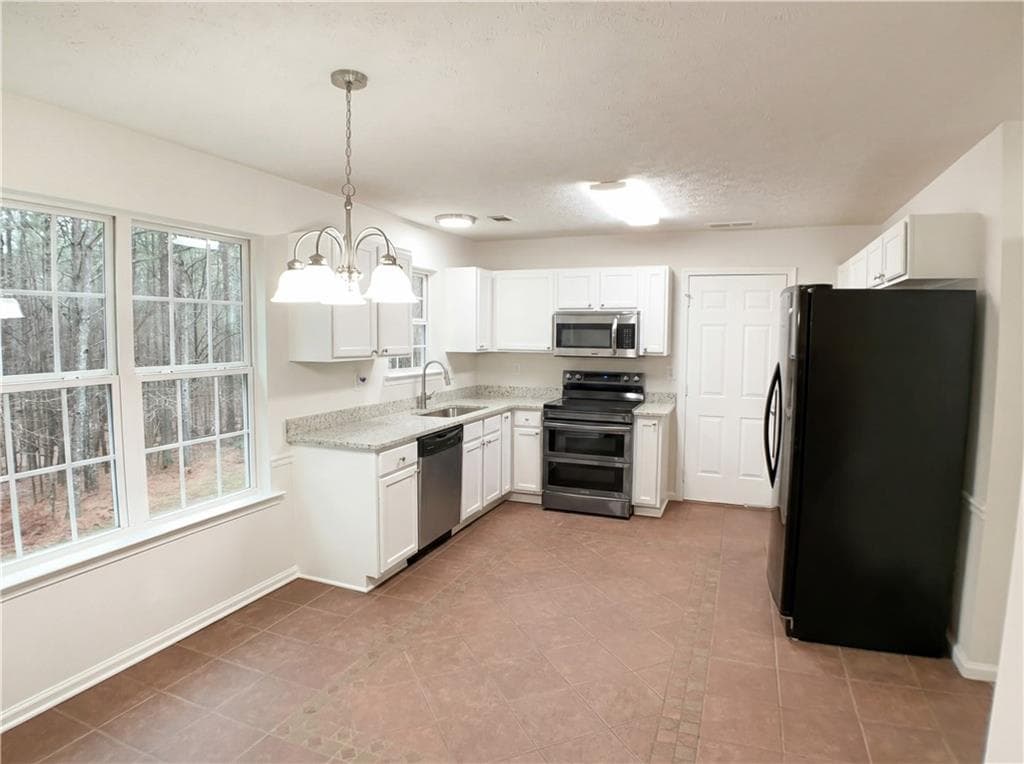 3 bedroom, 3 bathroom, 1,554 sq ft single family residence for sale at 1426 River Falls View, Monroe, GA 30655 — photo 7