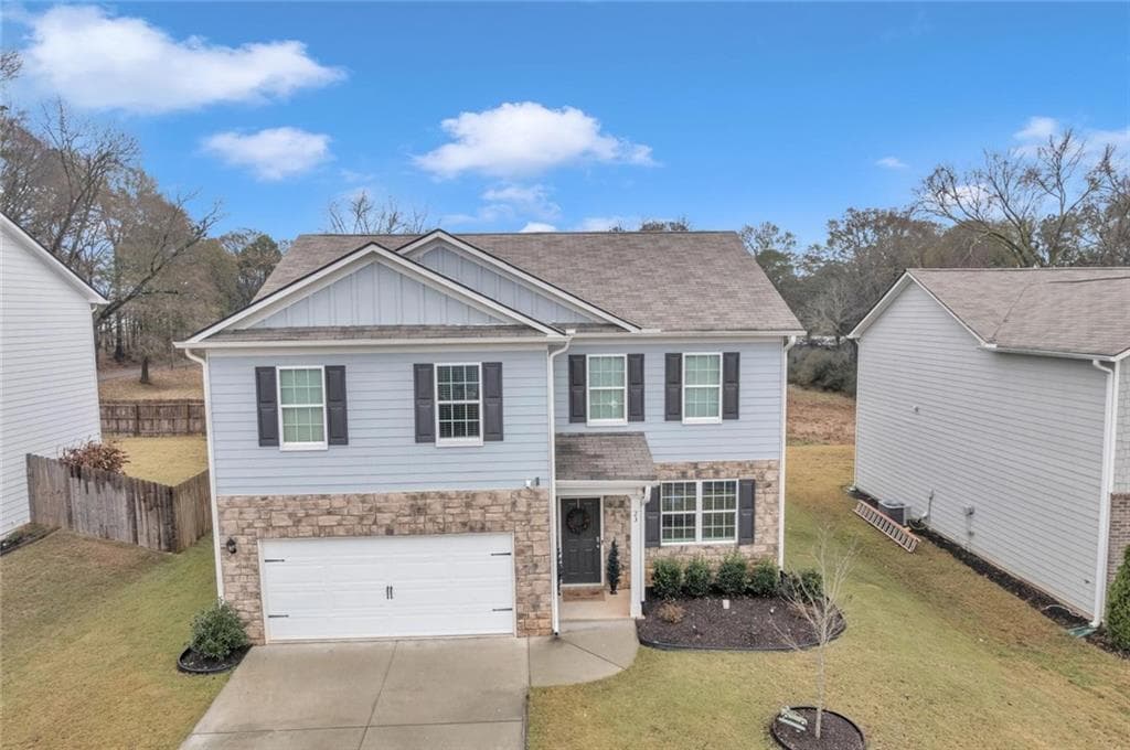 4 bedroom, 3 bathroom, 2,420 sq ft single family residence for sale at 23 Embry Boulevard, Pendergrass, GA 30567 — photo 2