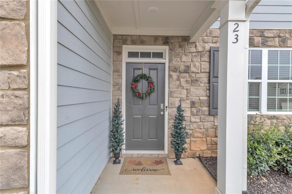 4 bedroom, 3 bathroom, 2,420 sq ft single family residence for sale at 23 Embry Boulevard, Pendergrass, GA 30567 — photo 3