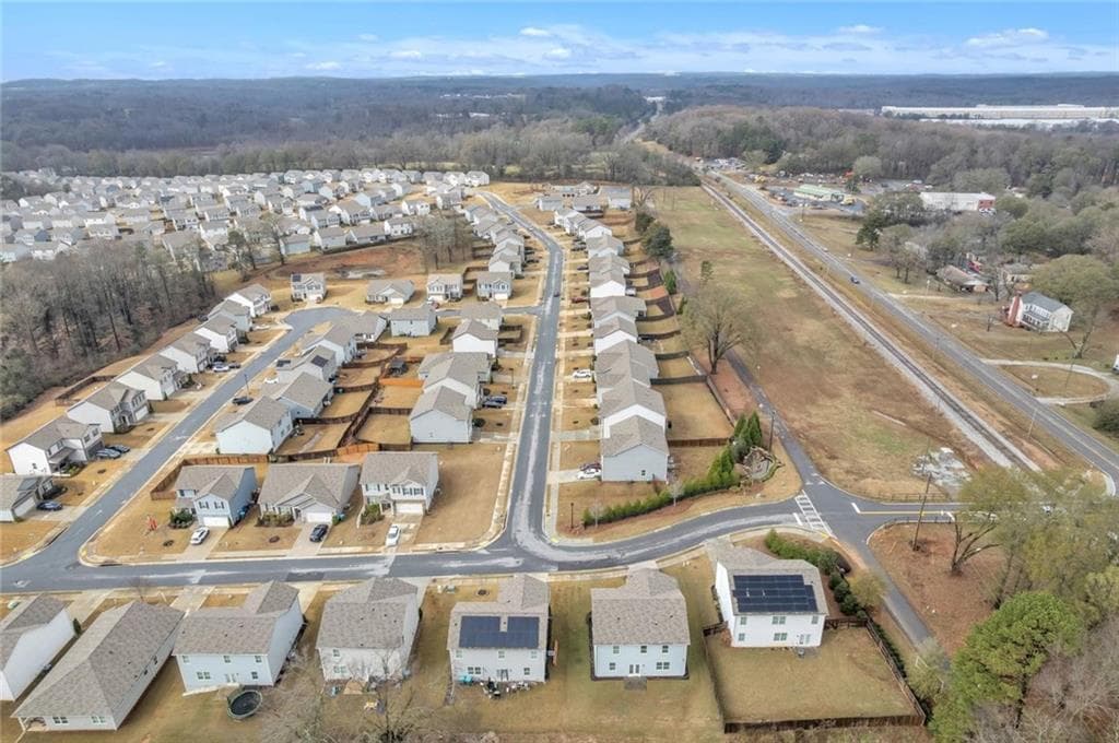4 bedroom, 3 bathroom, 2,420 sq ft single family residence for sale at 23 Embry Boulevard, Pendergrass, GA 30567 — photo 4