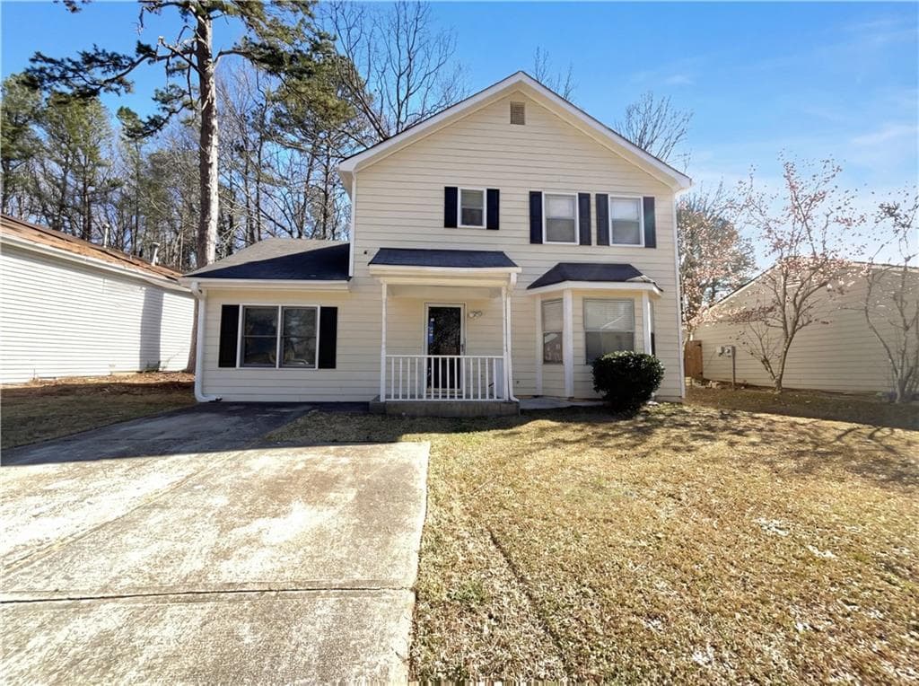 4 bedroom, 4 bathroom, 1,959 sq ft single family residence for sale at 5328 Ridge Forest Drive, Stone Mountain, GA 30083