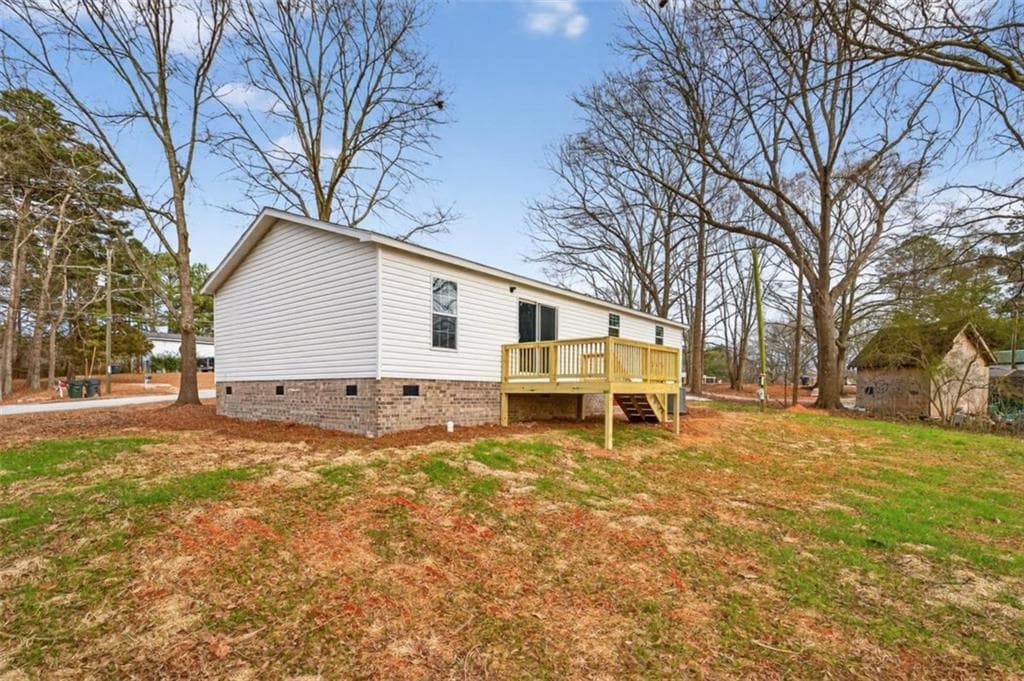 3 bedroom, 2 bathroom, 1,344 sq ft single family residence for sale at 720 Woodland Circle, Loganville, GA 30052 — photo 4