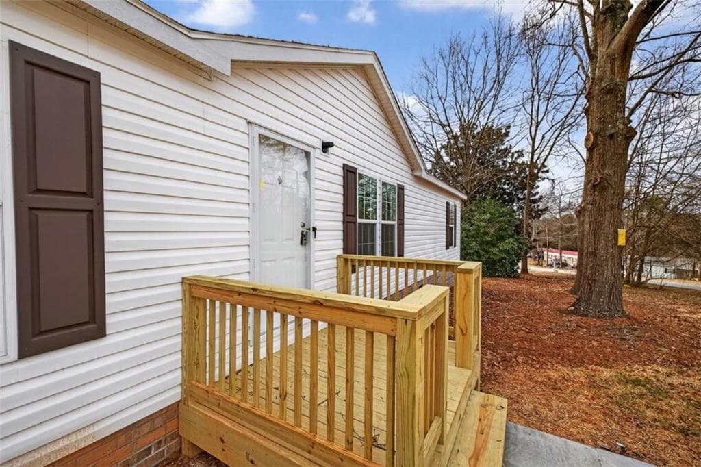 3 bedroom, 2 bathroom, 1,344 sq ft single family residence for sale at 720 Woodland Circle, Loganville, GA 30052 — photo 9