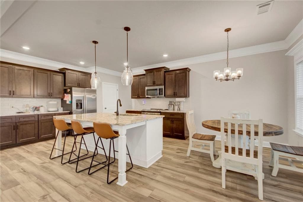 4 bedroom, 3 bathroom, 2,423 sq ft single family residence for sale at 706 Lindsey Brooke Trace, Bonaire, GA 31005 — photo 5