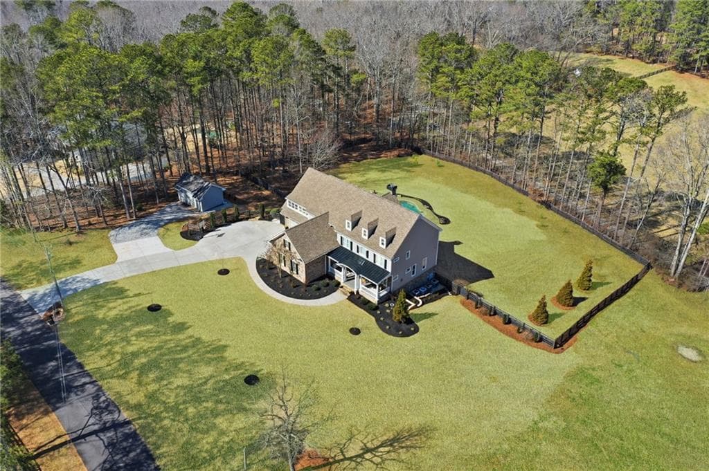 5 bedroom, 7 bathroom, 5,189 sq ft single family residence sold at 140 Woodmont Court, Canton, GA 30115