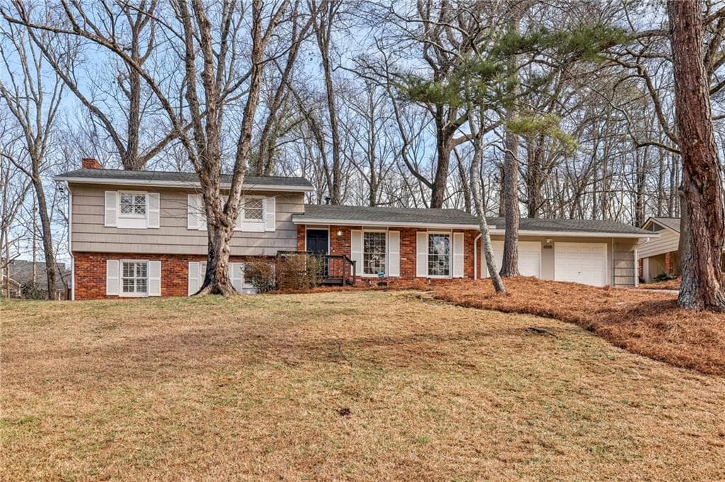 4 bedroom, 3 bathroom, 1,877 sq ft single family residence under contract at 6555 Williamson Drive, Atlanta, GA 30328 — photo 2
