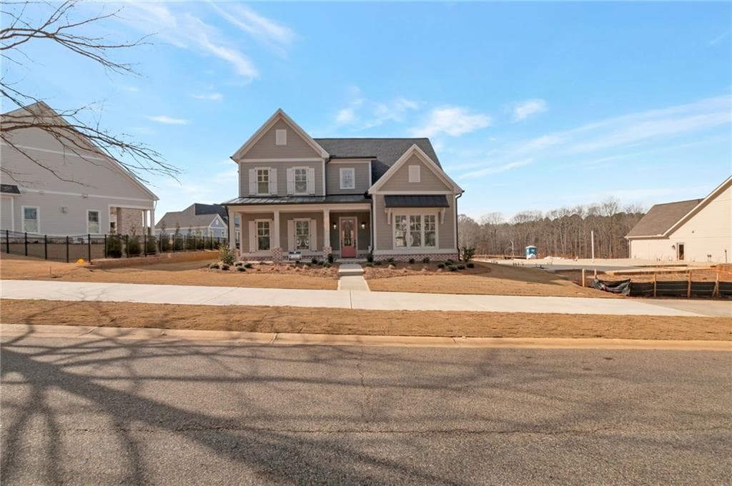 4 bedroom, 4 bathroom, 3,125 sq ft single family residence for sale at 1657 Georgia Club Drive, Statham, GA 30666 — photo 2