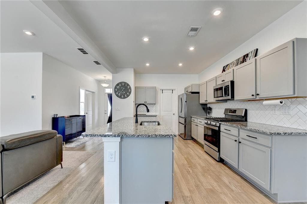 5 bedroom, 4 bathroom, 2,789 sq ft single family residence for sale at 611 Sugar Prairie Bend, Lawrenceville, GA 30045 — photo 8