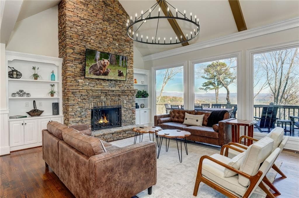 7 bedroom, 5 bathroom, 7,000 sq ft single family residence for sale at 1492 Mcelroy Mountain Drive, Jasper, GA 30143 — photo 1 of 76