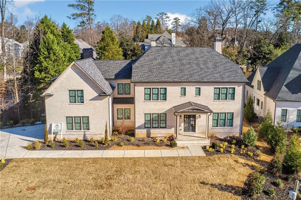 6 bedroom, 8 bathroom, 7,022 sq ft single family residence sold at 1445 W Wesley Road, Atlanta, GA 30327