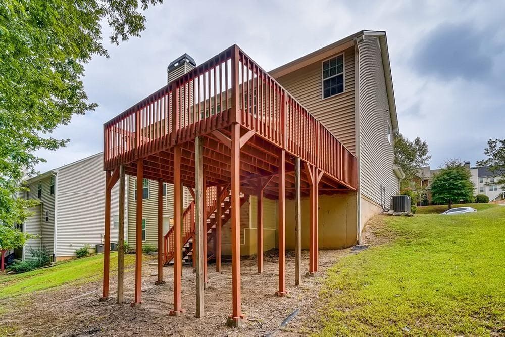 5 bedroom, 3 bathroom, 3,021 sq ft single family residence for sale at 1726 River Mill Trail, Conyers, GA 30012 — photo 4