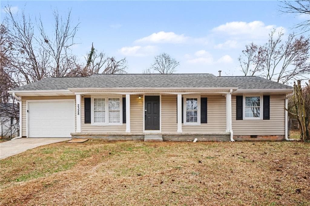 4 bedroom, 2 bathroom, 1,236 sq ft single family residence for sale at 2328 Emerald Lake Court, Decatur, GA 30035 — photo 1 of 18