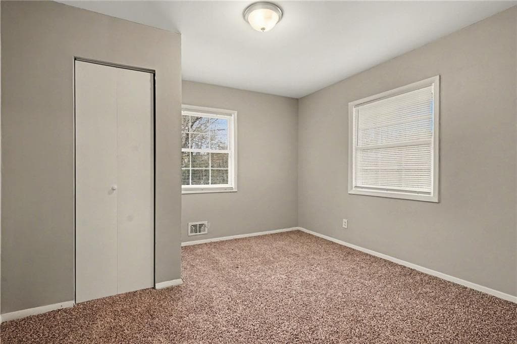 4 bedroom, 2 bathroom, 1,236 sq ft single family residence for sale at 2328 Emerald Lake Court, Decatur, GA 30035 — photo 7