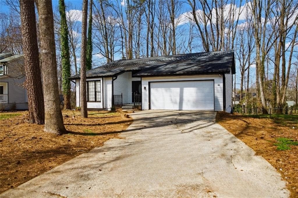 3 bedroom, 2 bathroom, 2,300 sq ft single family residence sold at 345 Deerwood Drive, Suwanee, GA 30024