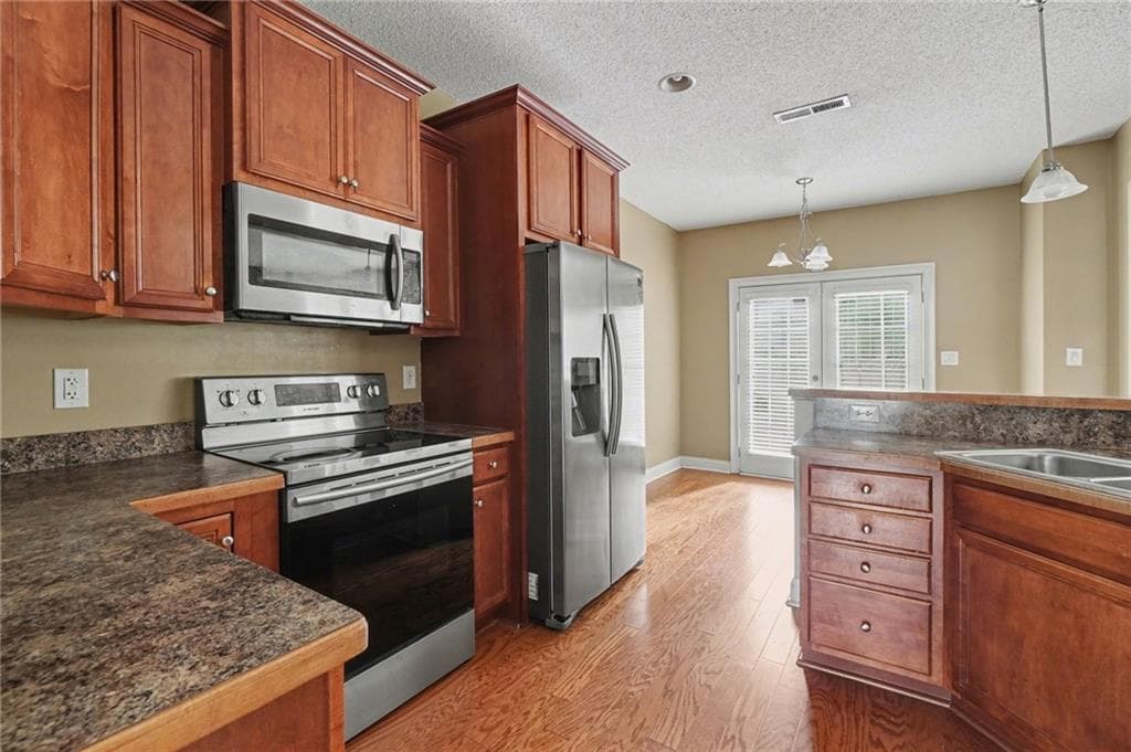 4 bedroom, 3 bathroom, 2,446 sq ft single family residence for sale at 608 Enterkin Court, Atlanta, GA 30349 — photo 6