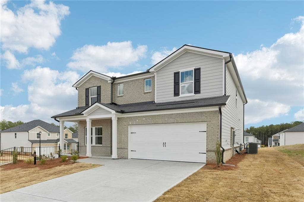 5 bedroom, 3 bathroom, 2,950 sq ft single family residence under contract at 213 Soseby Lake Lane, Grayson, GA 30017 — photo 2