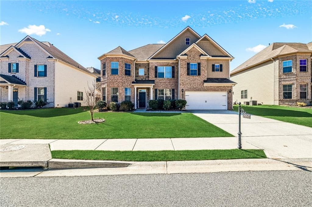 6 bedroom, 4 bathroom, 4,042 sq ft single family residence sold at 5550 Mirror Lake Drive, Cumming, GA 30028