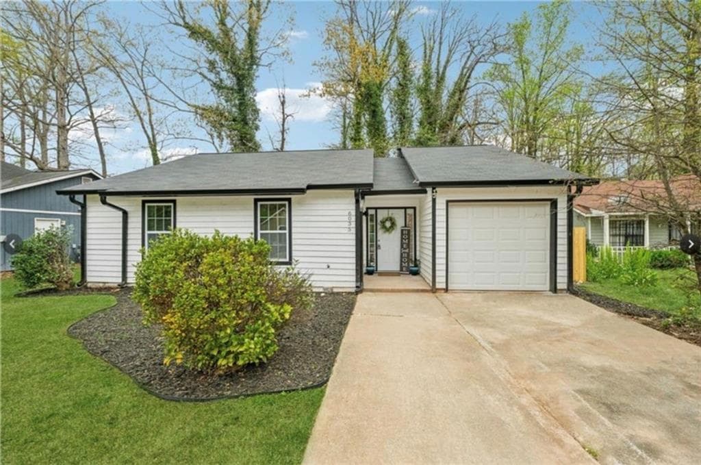 3 bedroom, 2 bathroom, 1,226 sq ft single family residence for sale at 6035 Creekford Drive, Lithonia, GA 30058 — photo 2