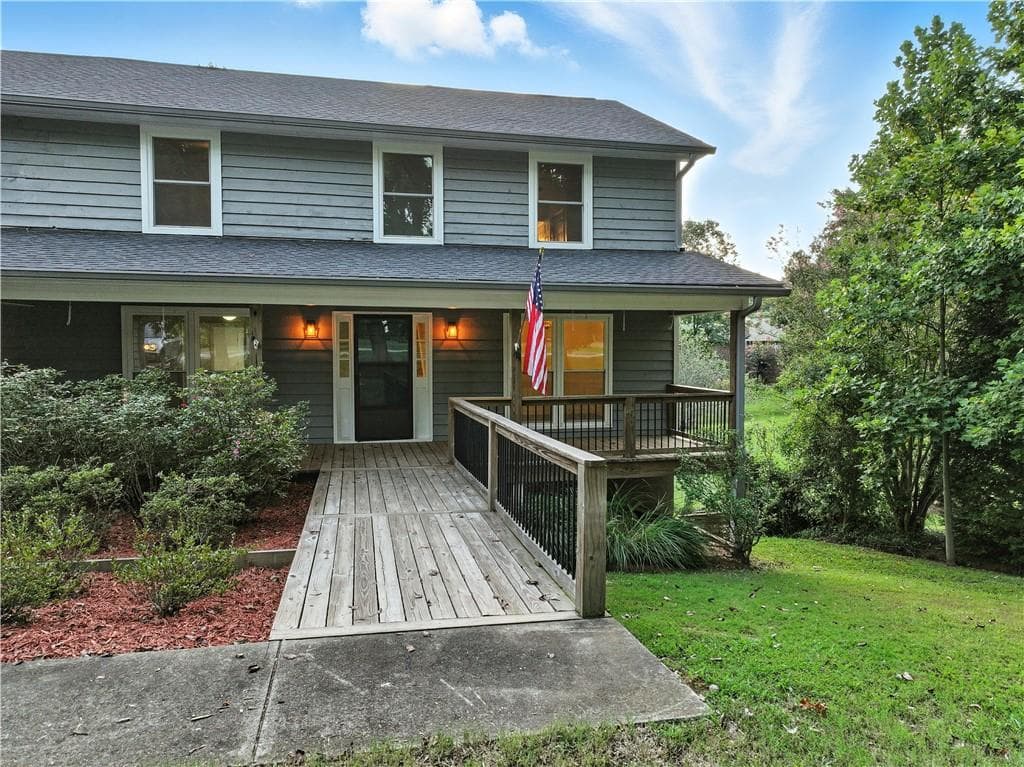 5 bedroom, 5 bathroom, 5,144 sq ft single family residence for sale at 3235 Clarks Bridge Road, Gainesville, GA 30506 — photo 2