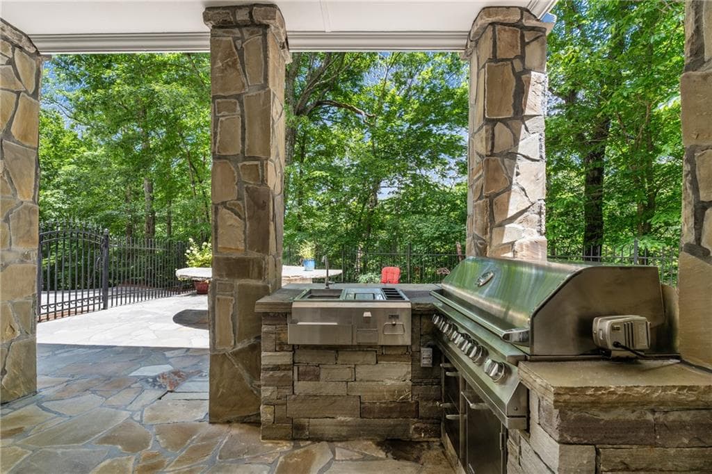 5 bedroom, 6 bathroom, 7,384 sq ft single family residence for sale at 9035 River Run, Atlanta, GA 30350 — photo 5