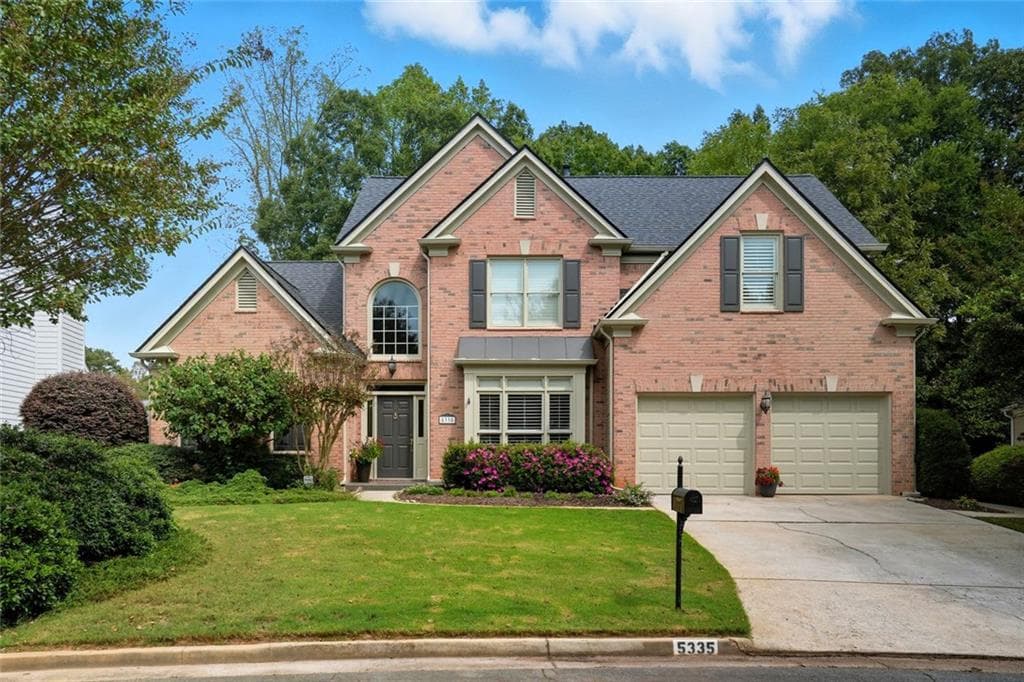 4 bedroom, 3 bathroom, 3,345 sq ft single family residence sold at 5335 Briarleigh Close, Dunwoody, GA 30338