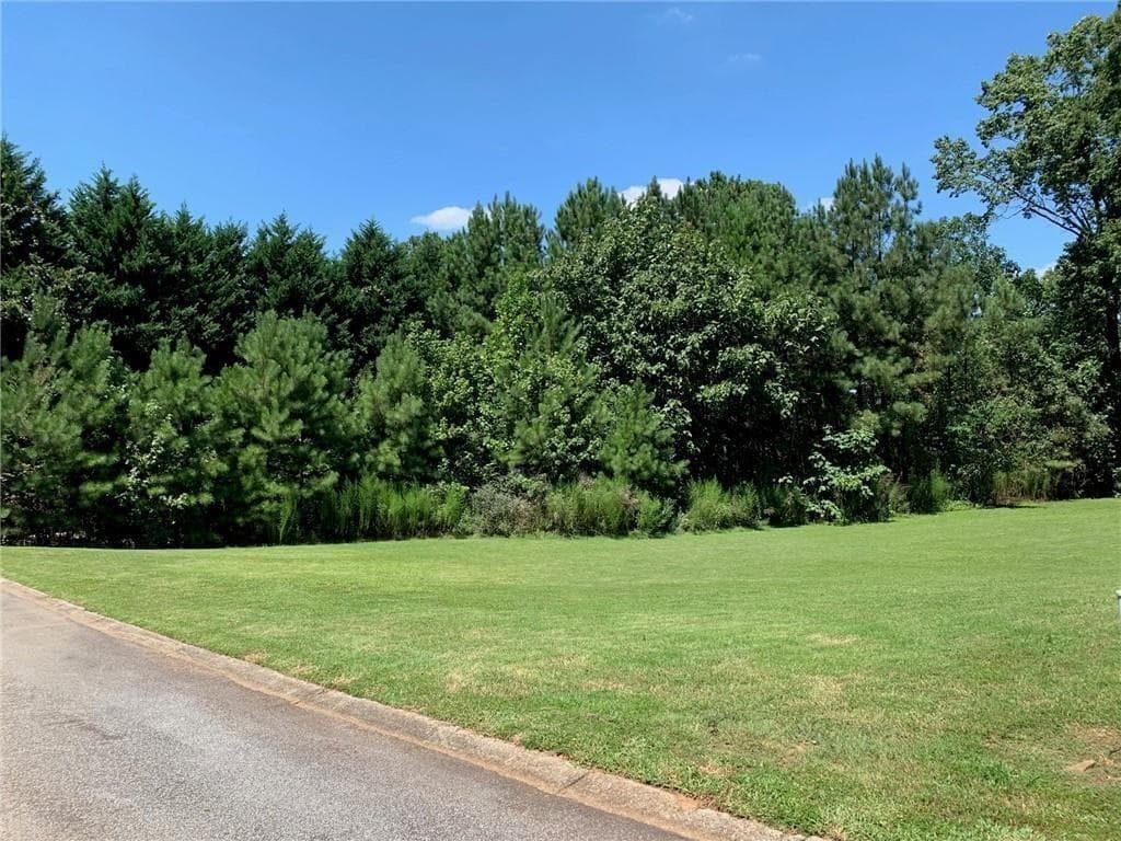unimproved land for sale at 8141 Nesbit Ferry Road, Atlanta, GA 30350 — photo 1 of 2