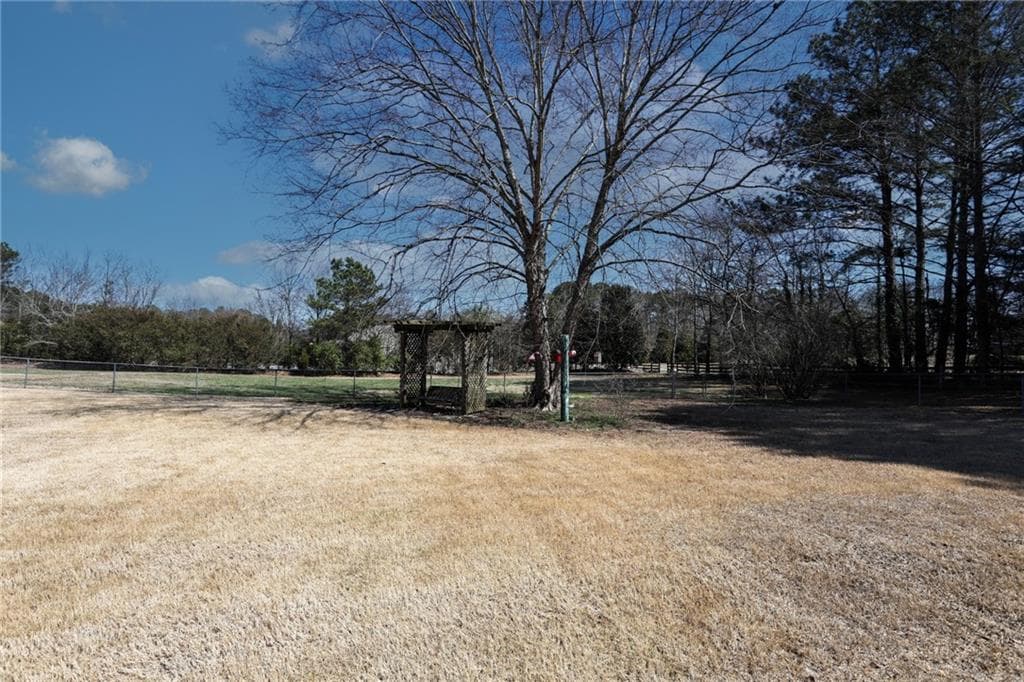 4 bedroom, 3 bathroom, 2,330 sq ft single family residence for sale at 4821 Lenora Church Road, Snellville, GA 30039 — photo 5